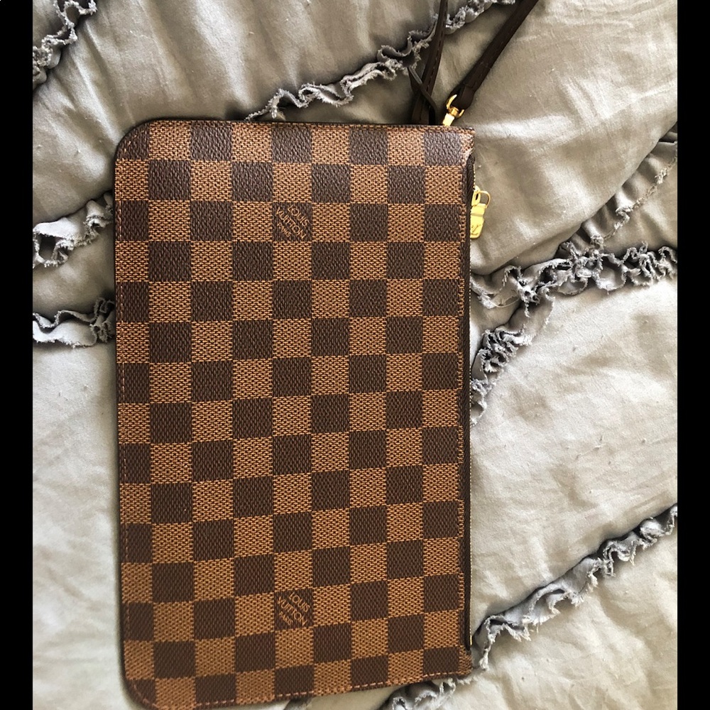 Authentic Louis Vuitton wristlet.